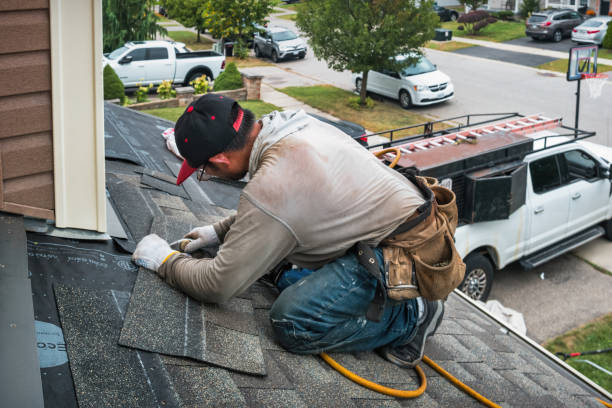 Professional Roofing technician working in Albany, IN